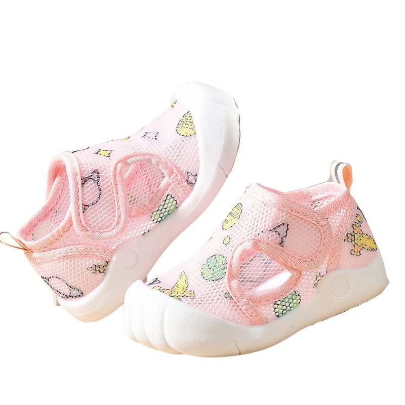 pink mesh baby shoes on a white background