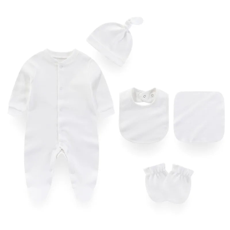 White baby outfit set with onesie, hat, bib, burp cloth, and mittens on a white background