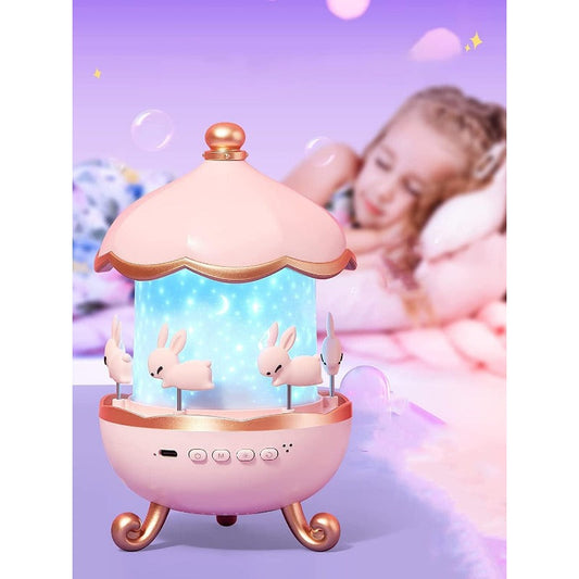 Pink carousel toy with rabbits on a purple background