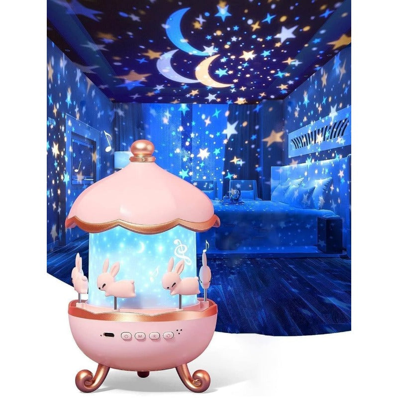 Pink carousel-shaped night light with rabbits inside, set against a starry room ceiling.