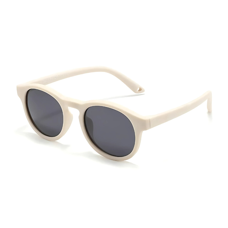white colored kids sun glasses on a white background