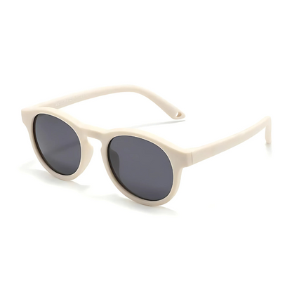 white colored kids sun glasses on a white background