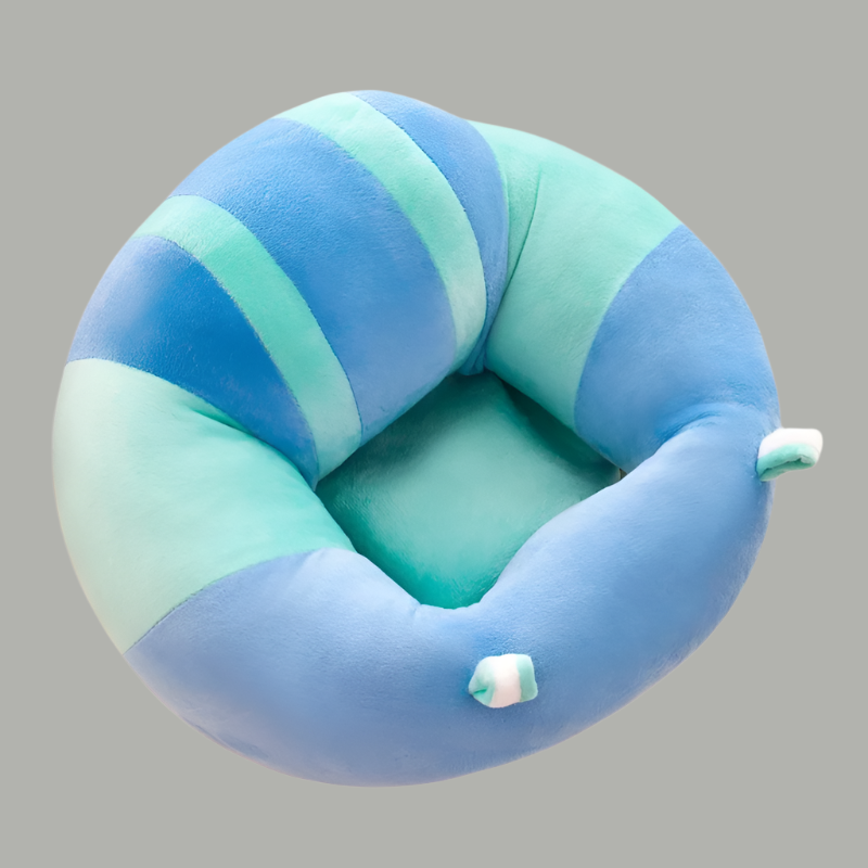 Blue and green striped striped baby floor plush seat shaped like a caterpillar on a Grey background white background