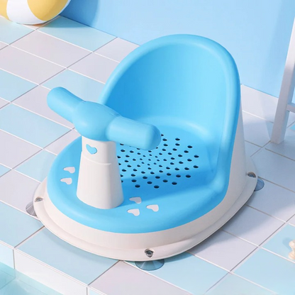 Blue bath seat with a white base on a tiled bathroom floor