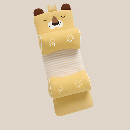 Yellow cartoon character baby head shaping pillow on a neutral background
