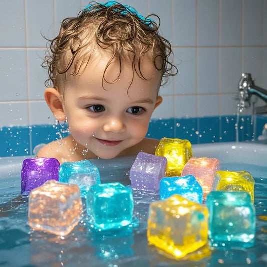 Child playing with colorful ice cubes in a bathtub