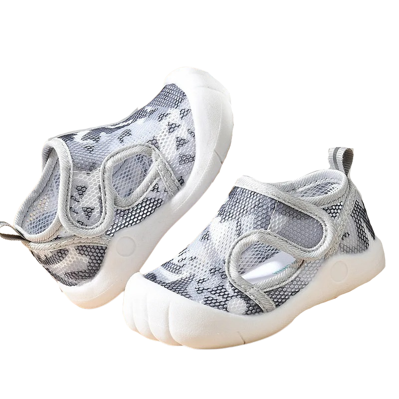 gray mesh baby shoes on a white background