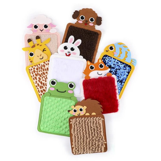Set of colorful animal-themed pet toys on a white background