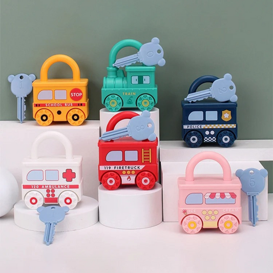 Set of colorful toy vehicle locks with corresponding keys on a white surface against a green background