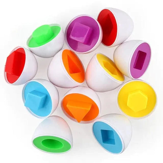 Colorful geometric shape sorting toys on a white background