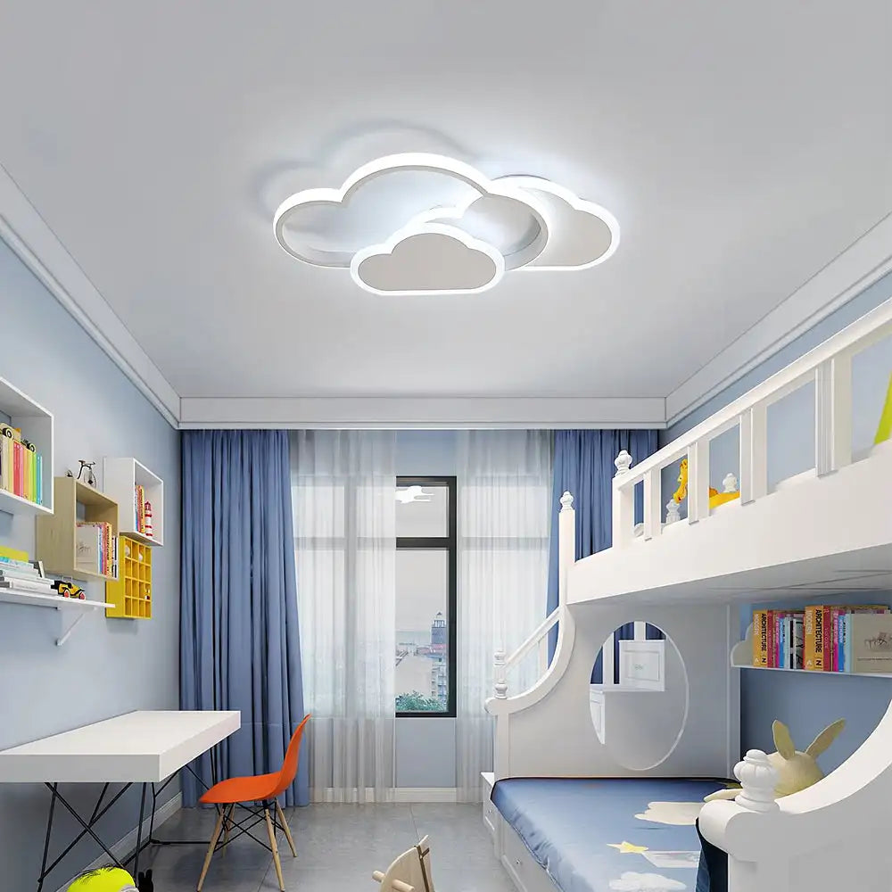 Children's room with a cloud-shaped ceiling light fixture.