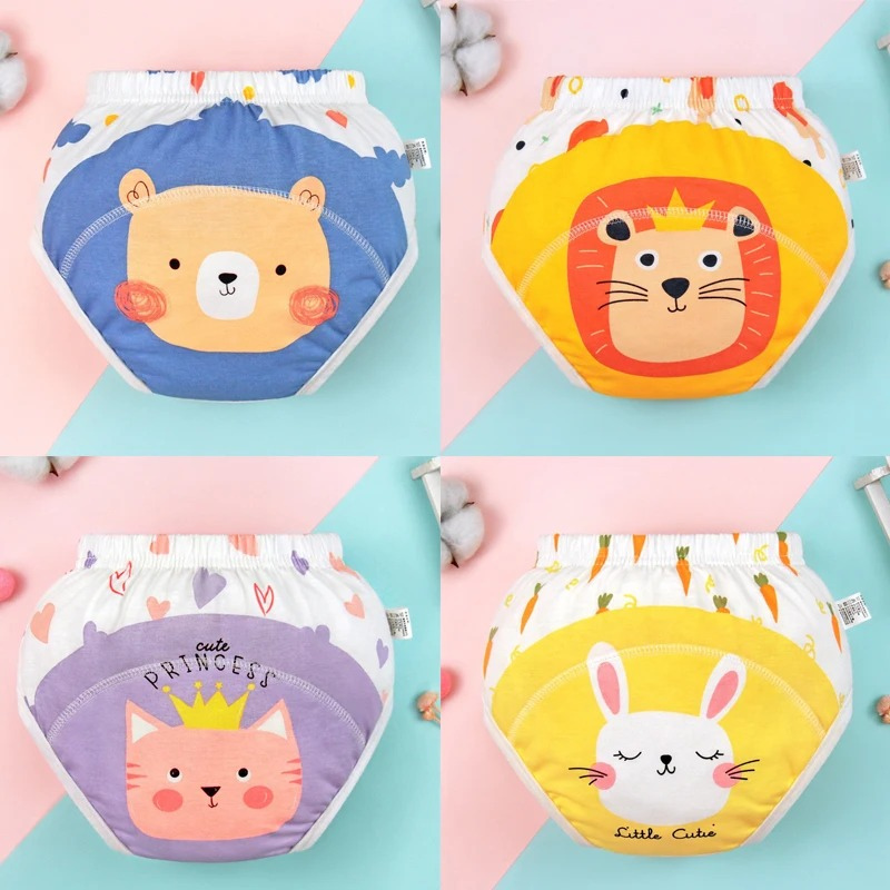 Four children's cartoon-themed pottyready pants on a colorful background