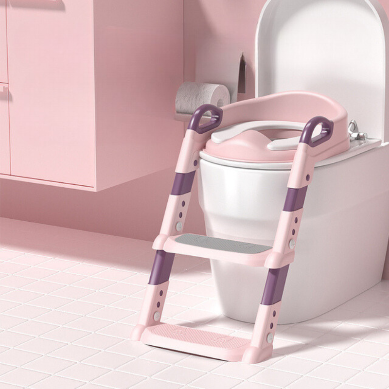 Pink PottyStepper attached to toilet to showcase use case scenario.