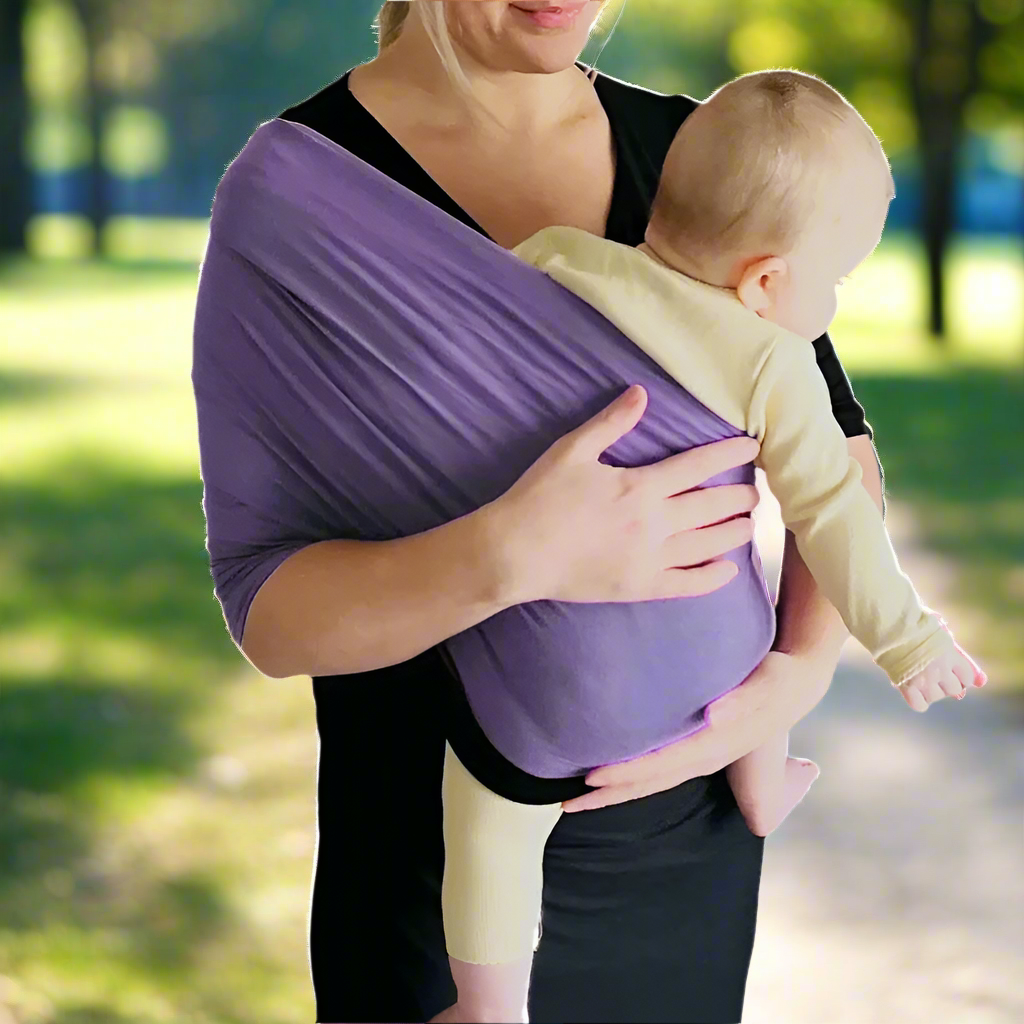 BabyCarry sling wrap in purple and black colorway highlighting the soft fabric and ergonomic shape.