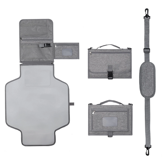 Gray baby changing mat and strap details on a white background