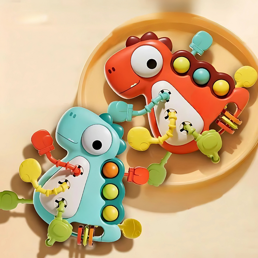 Two colorful baby teething toys on a beige plate.