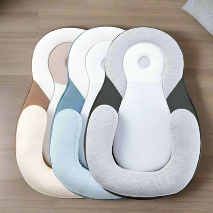 Three baby Loungers in different colors on a brown background