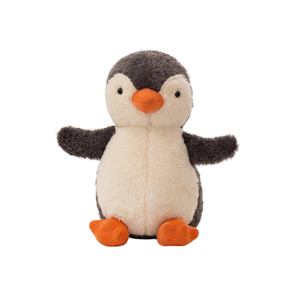 Plush penguin toy on a white background