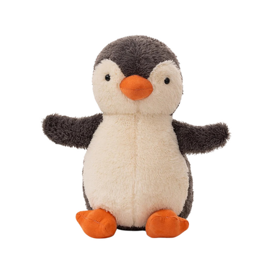 Plush toy penguin with orange beak and feet on a white background