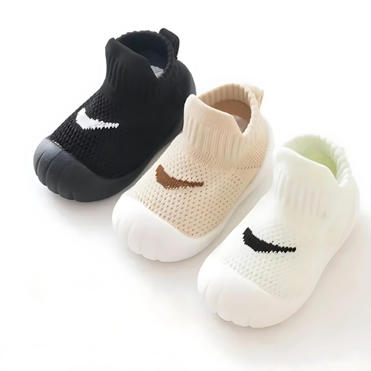 3 different colour display of sock shoes on a white background