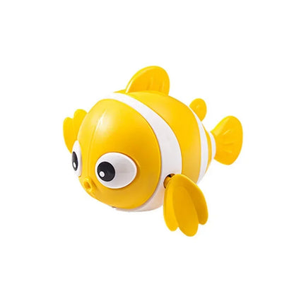 Yellow and white toy fish on a white background