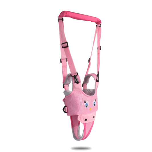 Pink baby walking harness hanging showing adjustable straps and secure buckles.