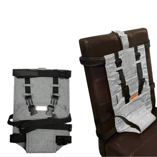 Child seat harness with gray interior and black straps on a white background